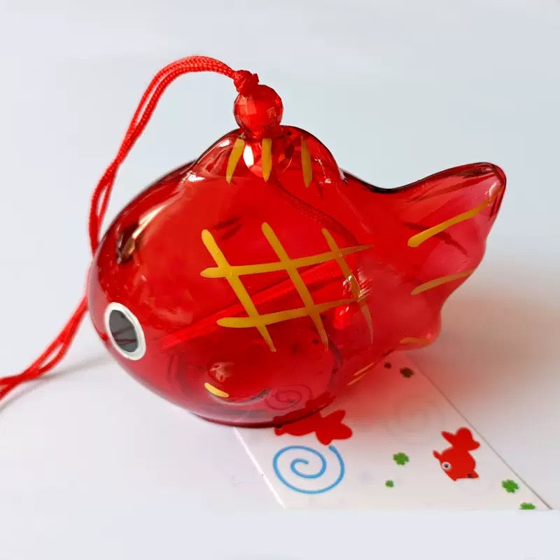 Red goldfish-shaped Japanese glass furin wind chime with matching tanzaku paper strip