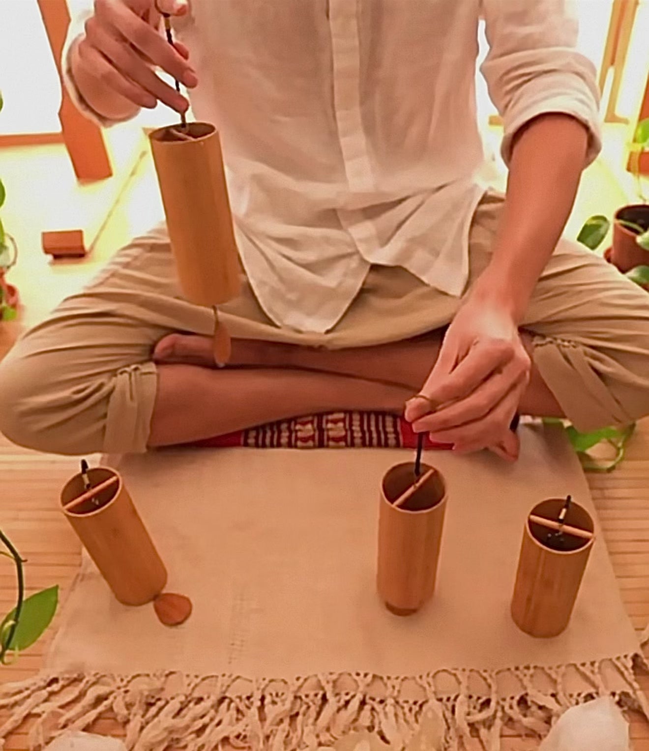 Video of Japanese bamboo meditation wind chimes creating soothing chord-like sounds for relaxation and peaceful home decor.